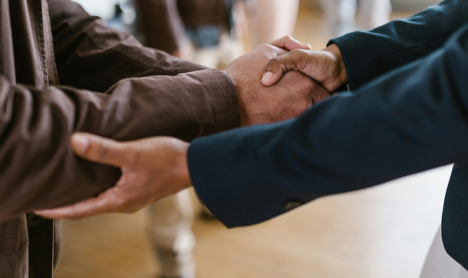 Business Deal agreed in conference room, Redditch
